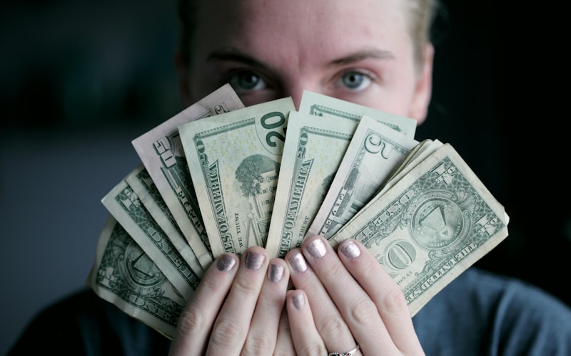 Examining a coin with magnifying glass